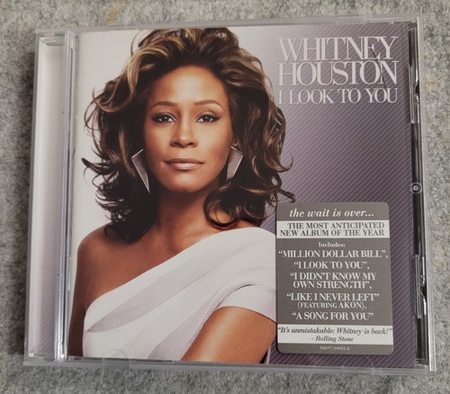 Whitney houston look to - :,